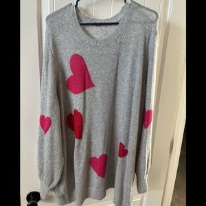 Grey sweater with red and pink hearts